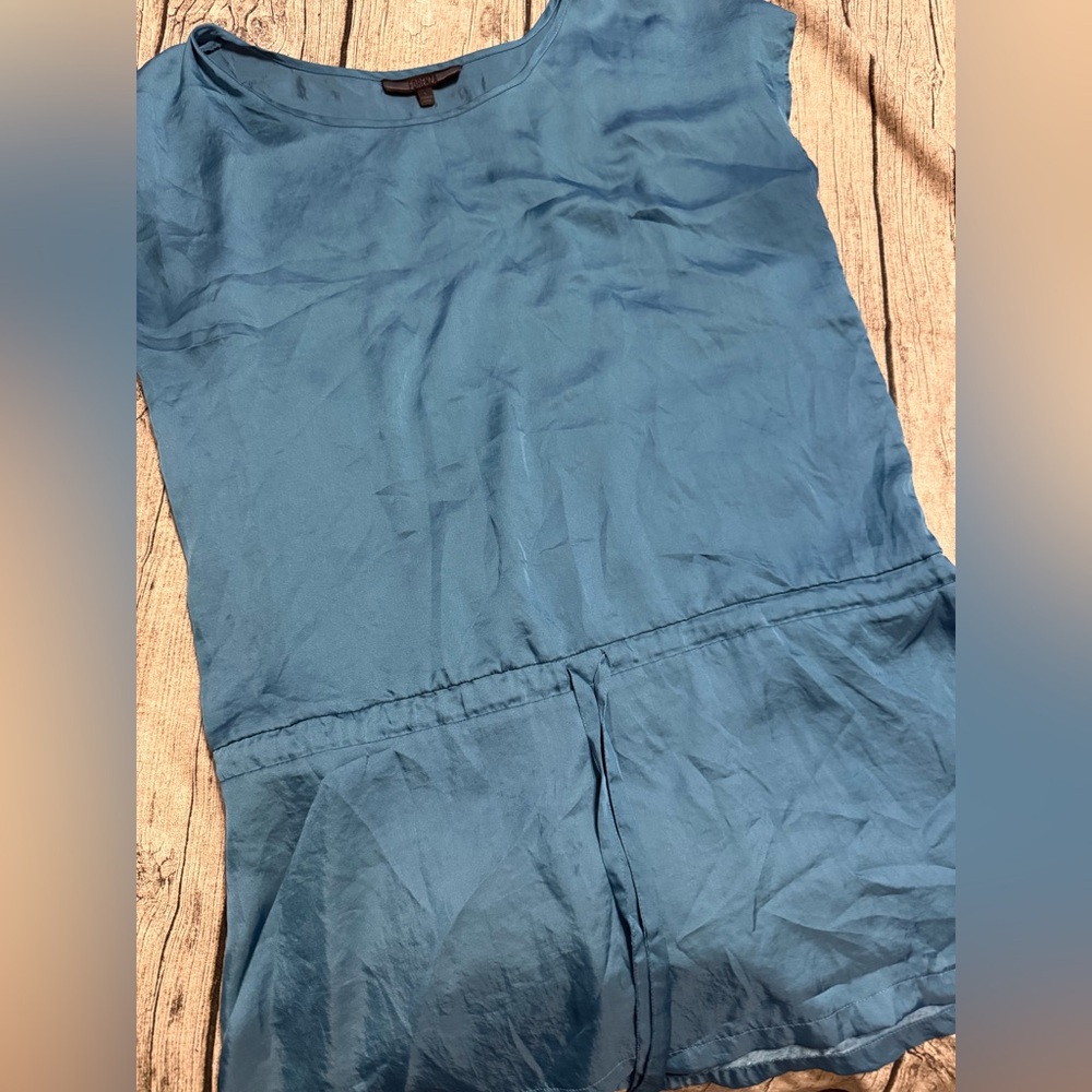 Like new. Silky Blouson top, ties at waist. Blue, size L